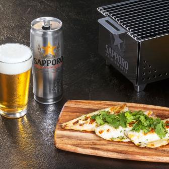 Sapporo beer served with grilled mackerel with a togarashi salt cure